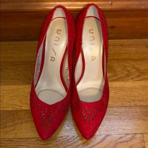 Lightly worn red heels